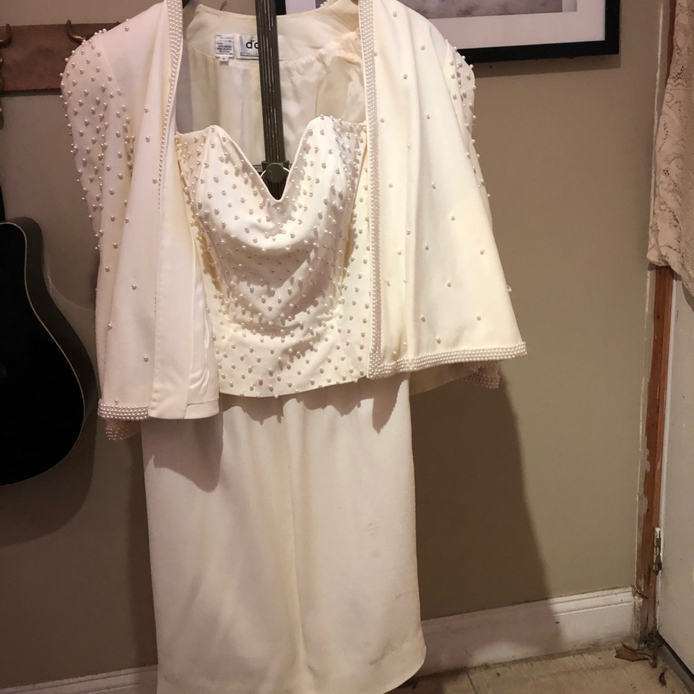 White Pearl Blazer, Corset, and Skirt.